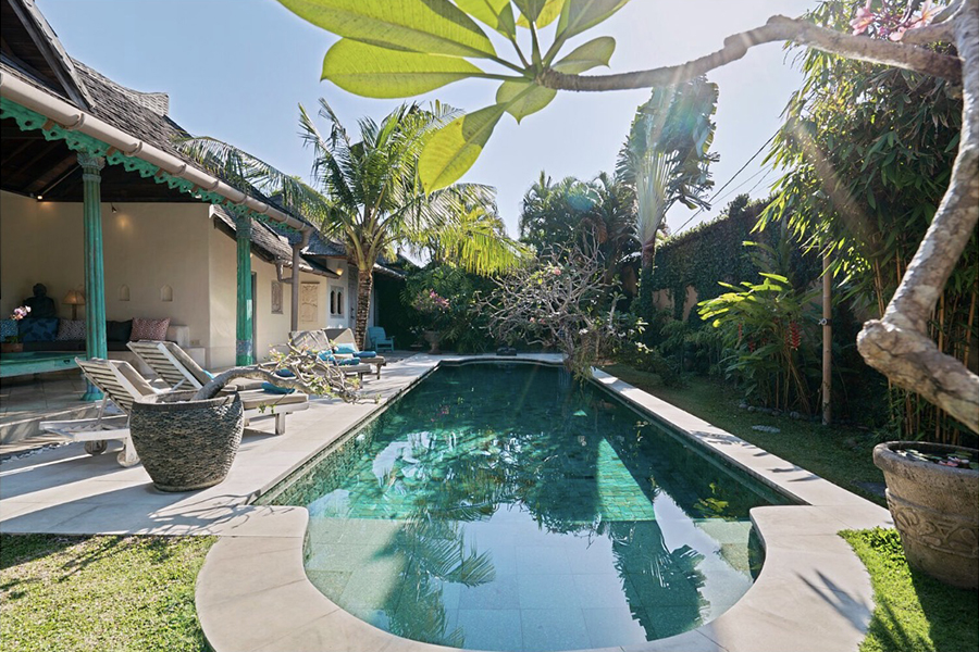 Arise from a radiant canopy bed and walk out into the relaxing poolside oasis to refill your glass.